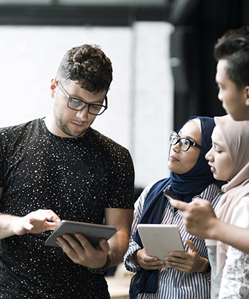 woman smiling at laptop