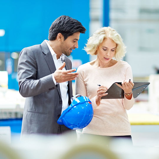 woman smiling at laptop